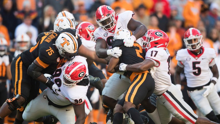 Tennessee running back Jabari Small (2) is tackled during an SEC football homecoming game between the Tennessee Volunteers and the Georgia Bulldogs in Neyland Stadium in Knoxville on Saturday, Nov. 13, 2021.

Tennesseegeorgia1113 1168